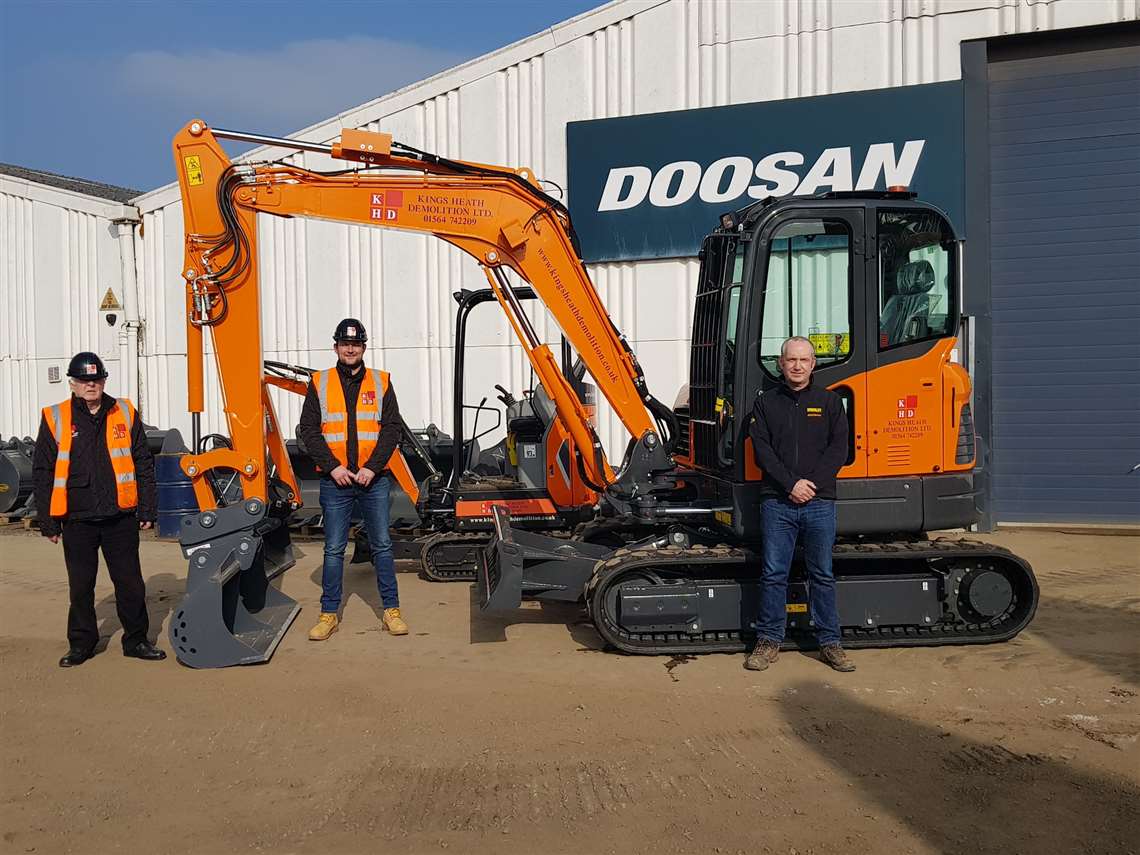 Kings Heath Demolition staff with new mini excavators