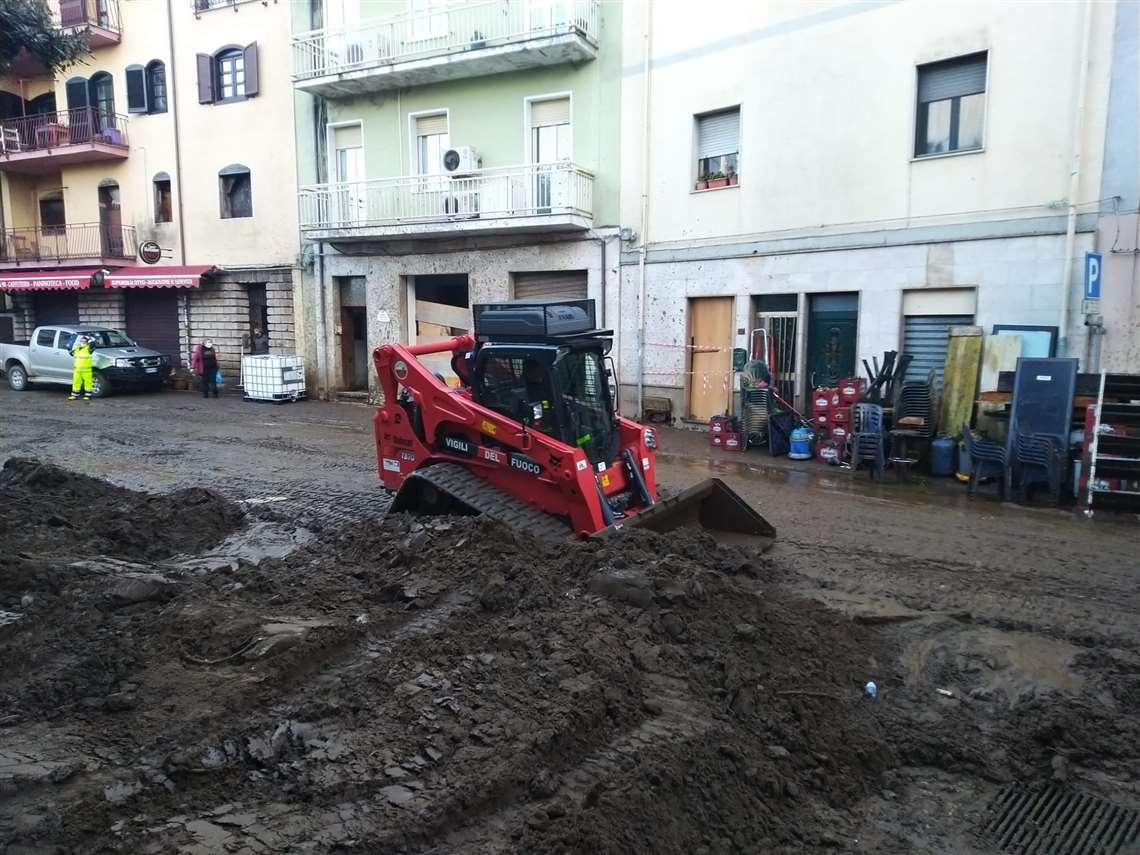 The Bobcat T870 loader at work on a disaster site