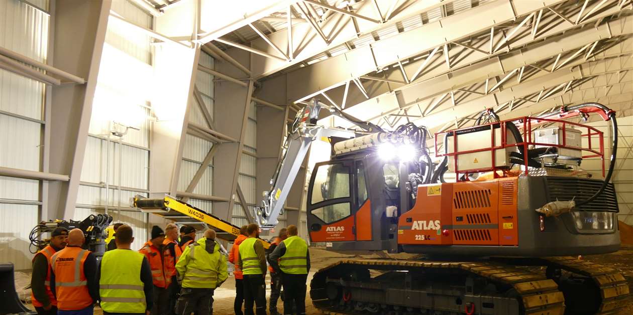 Armoured excavator deployed for remediation works at World War II