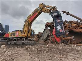 An MBI Eagle III shear mouted on an excavator