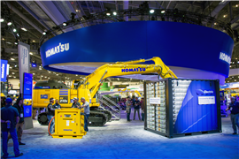 Komatsu's 2023 ConExpo stand featuring an electric excavator