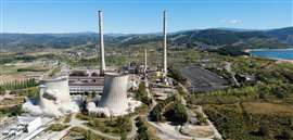 Explosions tearing through the two cooling towers at Compostilla power plant