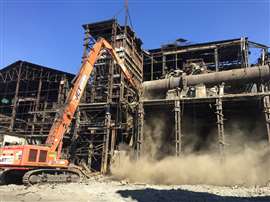 Jet Demolition's Hitachi high reach excavator on an industrial project site