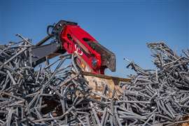 A LaBounty mobile shear attachment for scrap recycling.