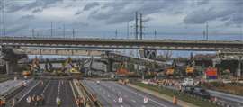 Aerial shot of the excavator fleet tearing down the final section of the Champlain Bridge