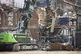 Tscherning's Liebherr excavator removing bits of scaffolding