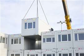 Setup of the 'container castle', home of the exhibition directory, in the outdoor area bauma