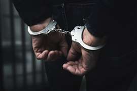 hands in handcuffs