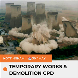 Power plant cooling towers mid explosive demolition