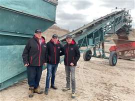 Brian Farmer (centre) with the Doughty Aggregates team