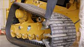 Image showing the crawler tracks on a piece of Caterpillar construction equipment. The OEM has published a library of videos and articles for customers to do DIY maintenance and repairs. (Photo: Caterpillar)