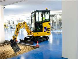 Komatsu's PC20E-6 electric mini excavator shown working indoors. (Image: Komatsu)