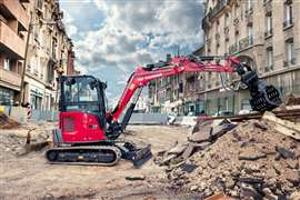 Photo of Yanmar CE’s SV39 mini excavator, working in an urban environment. (Image: Yanmar CE)