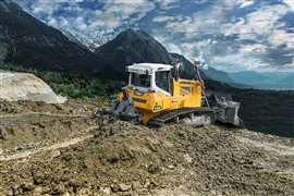 Um trator de esteiras Liebherr PR 736 G8 em operação com um cenário montanhoso ao fundo. A Liebherr afirma que o conforto do operador é fundamental em todos os seus projetos. (Imagem: Liebherr)