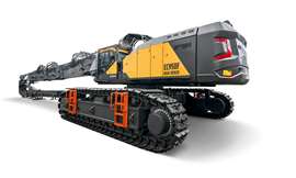 Large excavator in yellow and grey on white background