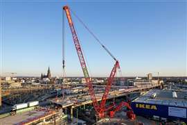 Large crane dismantling a bridge