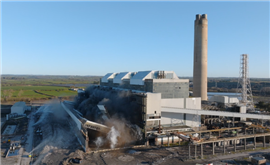 Power station in the process of being demolished by explosives