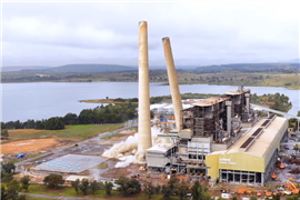 Power station with chimneys beginning to fall