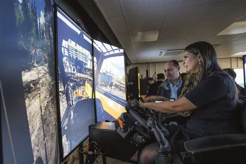 A worker training on a virtual reality rig