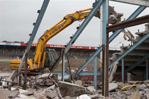 Cuddy's machines begin work on the demolition of Stradey Park's South stand