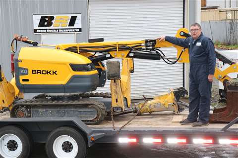 A Brock Rentals employee with a Brokk demolition robot