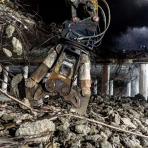 The MBI CR140R crusher demolishes the concrete bridge