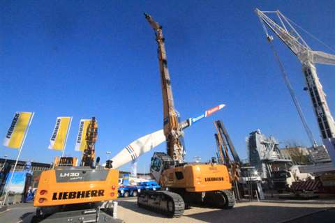 The Libebherr R 960, new at Intermat, rests in the early morning sunshine on the Parc des Exhibition