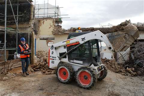 Erith Contractor's Bobcat Remote Control S450 skid steer loader onsite in London, UK.